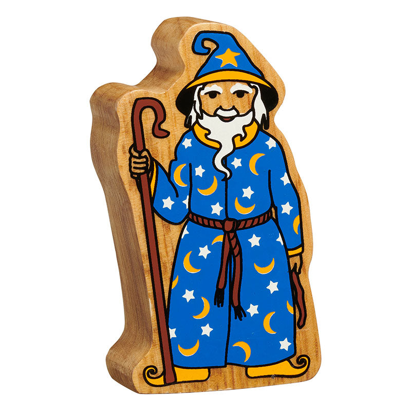 wooden wizard toy with painted white hair and beard and blue robes with a yellow moons and white stars