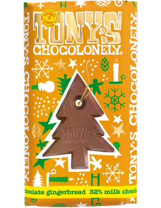 Tony's Chocolonely milk chocolate gingerbread bar in an orange wrapper with green, white and gold Christmas designs and a picture of the Christmas tree shaped centre of the Fairtrade and slavery free milk chocolate bar