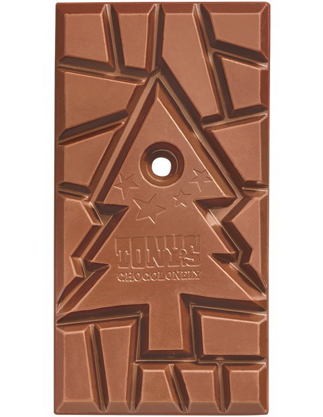 The unwrapped Fairtrade and slavery free Tony's Chocolonely milk chocolate gingerbread bar showing the irregular shaped pieces surrounding the press-out Christmas tree shaped centre.