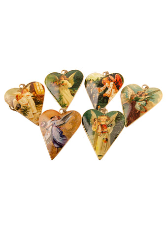 A set of six heart shaped tin Christmas decorations with vintage pictures of angels, on a white background